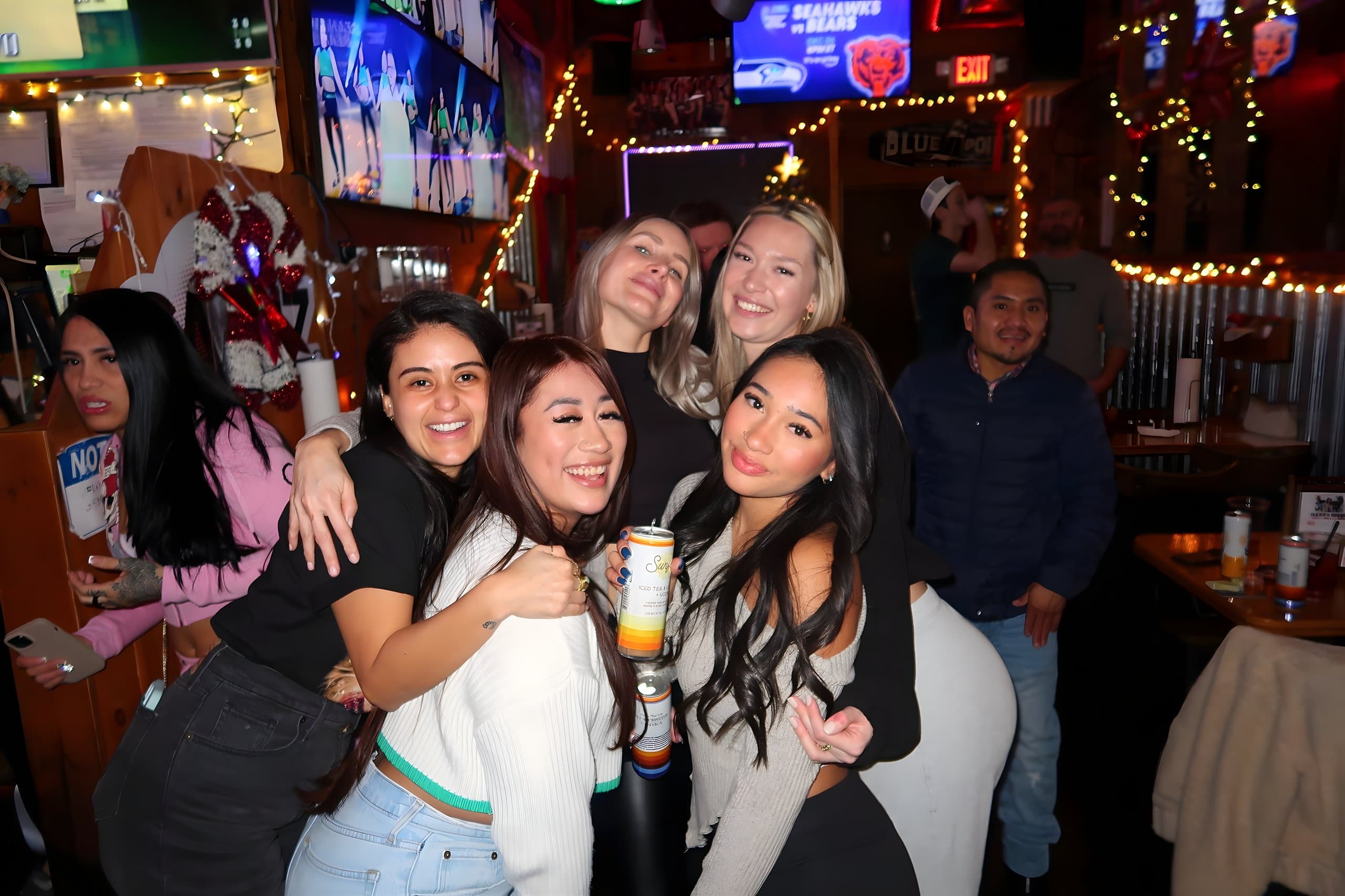 Friends celebrating together at a Canz holiday party